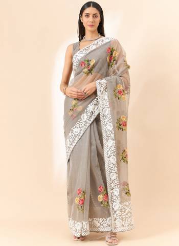 Attrective These Designer Party Wear Saree in Fine Colored.These Saree Are Organza And Blouse Art Silk is Fabricated.Its Beautified Desiger Floral Embroidery Work.