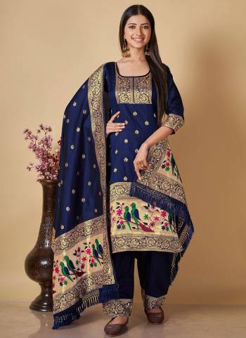 Garb This Suits In Lovely Color.Its Pretty Top Is Soft Banarasi Silk Based Paired Bottom Banarasi Silk And Banarasi Silk Fabricated Dupatta Are Wevon Jari,Thread Designer. Which Gives An Attractive To The Dress.