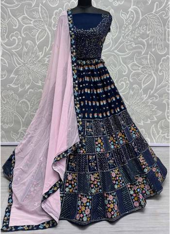 For A Fancy Designer Look,Grab These Lehenga Choli With Dupatta in Fine Colored.These Lehenga And Choli Are Georgette And Dupatta Are Fabricated On Georgette Pair.Its Beautified With Designer Sequance,Thread Embroidery Work.