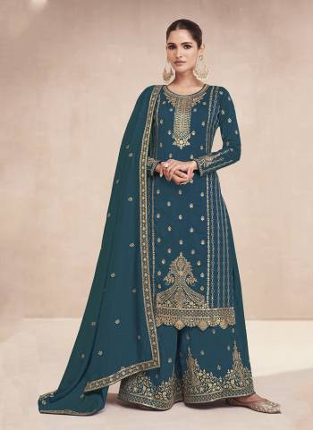 Garb These Designer Sharara Suits in Fine Colored Pair With Dupatta.These Top And Dupatta Are Fabricated On Silk Pair With Silk Bottom.Its Beautified With Designer Jari Embroidery Work