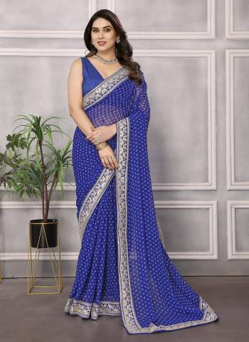 Garb These Party Wear Saree in Fine Colored.These Saree Are Georgette And Blouse is Art Silk Fabricated.Its Beautified With Dabby Designer Printed, Embroidery Work Lace Border.