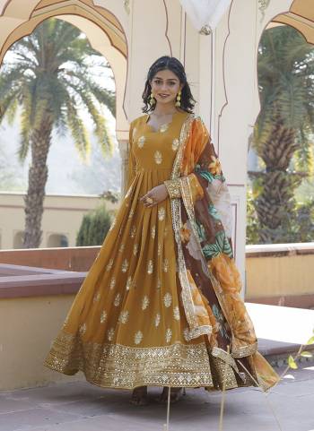 Attrective Looking These Beautiful Looking Readymade Long Gown With Dupatta.These Gown is Fabricated On Faux Georgette And Tabby Silk Dupatta.Its Beautified With Designer Jari, Sequance Embroidery Work Printed Dupatta.