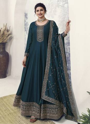 Garb These Party Wear Anarkali Suit in Fine Colored Pair With Bottom And Dupatta.These Top Are Silk Georgette And Dupatta Are Fabricated On Georgette Pair With Santoon Bottom.Its Beautified With Santoon Inner.Its Beautified With Heavy Designer Embroidery Work.