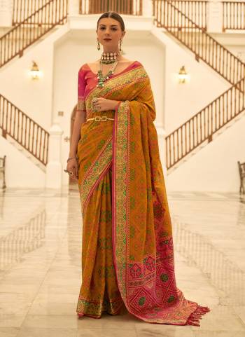 Looking These Party Wear Traditional Saree in Fine Colored.These Saree And Blouse is Fabricated On Banarasi Silk.Its Beautified With Weaving Patola Designer.