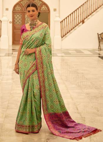 Looking These Party Wear Traditional Saree in Fine Colored.These Saree And Blouse is Fabricated On Banarasi Silk.Its Beautified With Weaving Patola Designer.