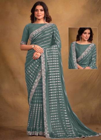 Look Attrective These Designer Party Wear Saree in Fine Colored.These Saree Are Georgette Kasab And Blouse Malai Satin is Fabricated.Its Beautified Desiger Embroidery,Stone Work.