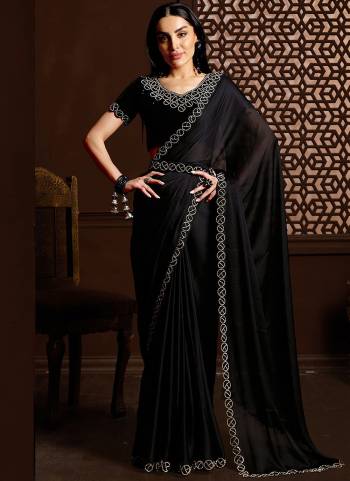 Garb These Party Wear Saree in Fine Colored.These Saree Are Satin Chiffon And Blouse is Fabricated On Satin Chiffon Pair.Its Beautified With Designer Stonework.