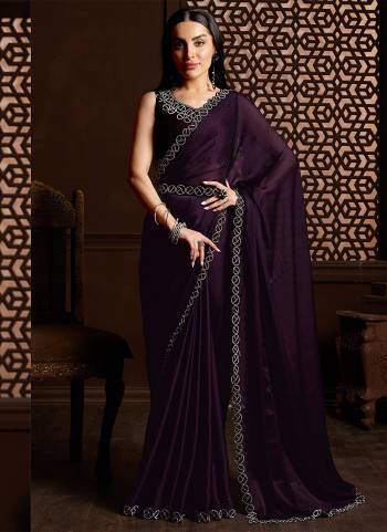 Garb These Party Wear Saree in Fine Colored.These Saree Are Satin Chiffon And Blouse is Fabricated On Satin Chiffon Pair.Its Beautified With Designer Stonework.