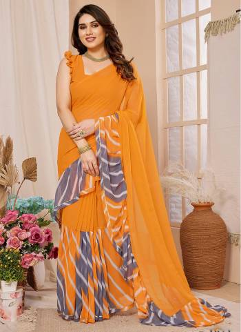 Garb These Party Wear Saree in Fine Colored.These Saree And Blouse is Fabricated On Georgette Pair.Its Beautified With Designer Printed With Ruffal.