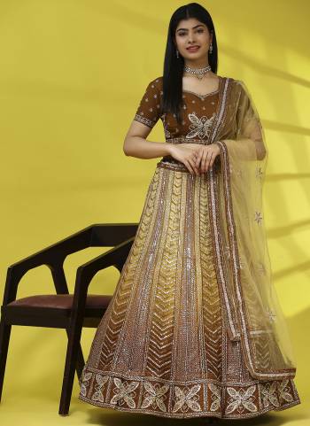 For A Fancy Heavy Designer Look,Grab These Lehenga Choli With Dupatta in Fine Colored.These Lehenga And Choli Are Net And Dupatta Are Fabricated On Net Pair.Its Beautified With Designer Sequance Embroidery Work.