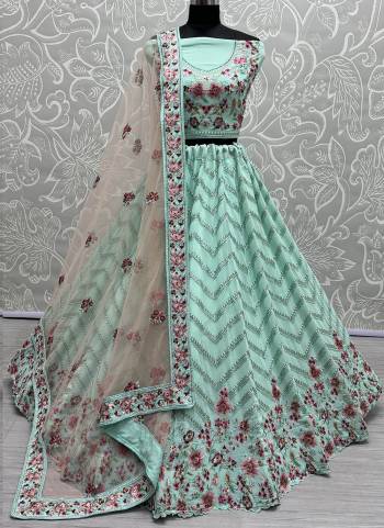 For A Fancy Designer Look,Grab These Lehenga Choli With Dupatta in Fine Colored.These Lehenga And Choli Are Georgette And Dupatta Are Fabricated On Soft Net Pair.Its Beautified With Designer Jari,Multy Thread Embroidery With Zarkan Diamond Work.