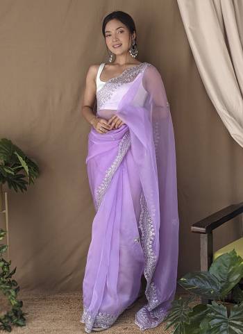 Attrective Looking These Party Wear Saree in Fine Colored.These Saree Are Organza And Blouse is Fabricated On Art Silk.Its Beautified With Designer Sequance Embroidery,Hand Work.