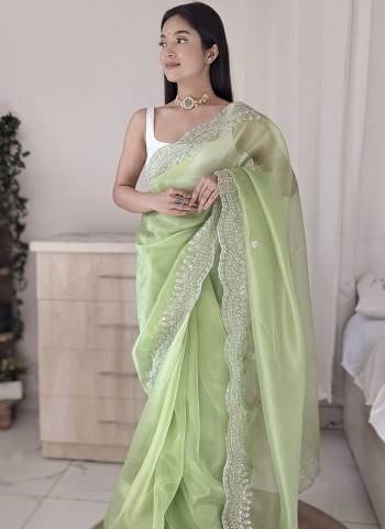 Attrective Looking These Party Wear Saree in Fine Colored.These Saree Are Organza And Blouse is Fabricated On Art Silk.Its Beautified With Designer Sequance Embroidery,Hand Work.