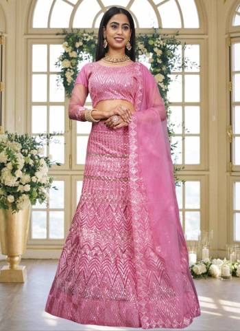 Grab These Beautiful Colored Lehenga Choli.These Lehenga and Dupatta Are Fabricated On Net Pair With Net Blouse.Its Beautified With Heavy Thread,Sequance Embroidery Work.