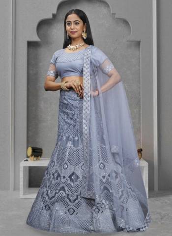 Looking These Beautiful Colored Lehenga Choli.These Lehenga and Dupatta Are Fabricated On Net Pair With Net Blouse.Its Beautified With Designer Sequance Embroidery Work.