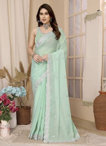 Looking These Party Wear Saree in Fine Colored.These Saree Are Zomato Chiffon And Blouse is Zamato Chiffon Fabricated.Its Beautified With Designer Sequance Embroidery Work.