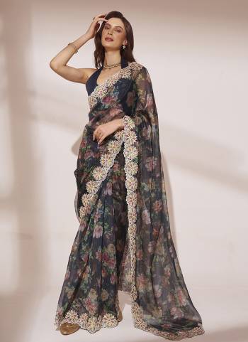 Looking These Party Wear Saree in Fine Colored.These Saree is Fabricated On Jimmy Choo Pair With Art Silk Blouse.Its Beautified With Designer Work Lace Border,Swarovski Work.