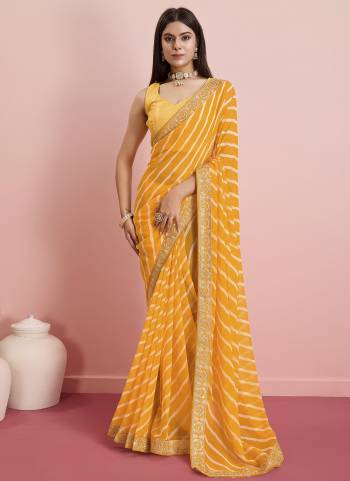 Looking These Designer Saree in Fine Colored.These Saree Are Georgette And Blouse is Art Silk Fabricated.Its Beautified With Designer Laheriya Printed, Embroidery Work Lace Border.