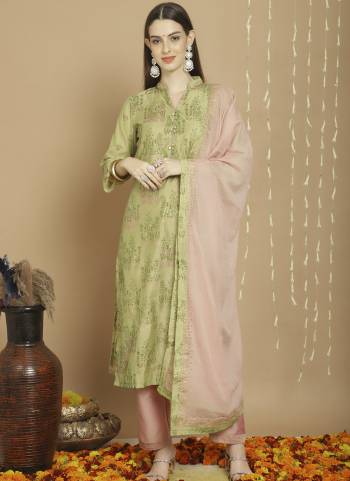 Attrective This Designer Long Length Suit In Lovely Color.Its Pretty Heavy Designer Embroidery Work Top Is Art Silk Based Paired With Two Tone Silk Bottom And Cotton Fabricated Dupatta Which Gives An Attractive To The Suit.