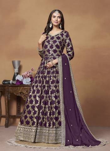 Garb These Party Wear Anarkali Suit in Fine Colored Pair With Bottom And Dupatta.These Top Are Dola Jacquard And Dupatta Are Fabricated On Chinon Pair With Santoon Bottom.Its Beautified With Santoon Inner.Its Beautified With Wevon Jari Designer With Embroidery Work.