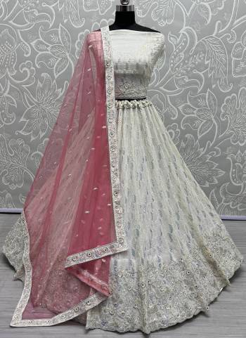 For A Fancy Designer Look,Grab These Lehenga Choli With Dupatta in Fine Colored.These Lehenga And Choli Are Georgette And Dupatta Are Fabricated On Soft Net Pair.Its Beautified With Designer Sequance,Dori,Jari,Thread Embroidery Work