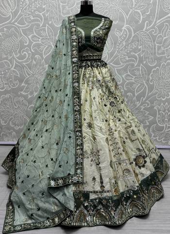 For A Fancy Designer Look,Grab These Lehenga Choli With Dupatta in Fine Colored.These Lehenga And Choli Are Viscose And Dupatta Are Fabricated On Georgette Pair.Its Beautified With Designer Sequance,Cotton Thread,Mirror Embroidery Work.