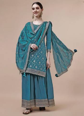 Attrective Looking These Party Wear Sharara Suit in Fine Colored Pair With Bottom And Dupatta.These Top Are Viscose Chinon And Dupatta Are Fabricated On Chinon Pair With Chinon Bottom.Its Beautified With Wevon Jacquard Designer With Embroidery Work.