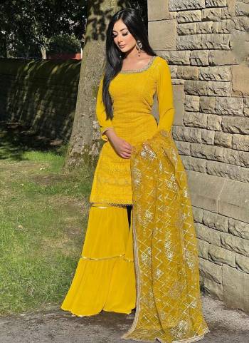 Attrective Looking These Special Sharara Suit in Fine Colored Pair With Bottom And Dupatta.These Top Are Faux Georgette And Dupatta Are Fabricated On Faux Georgette Pair With Faux Georgette Bottom.Its Beautified With Heavy Designer Embroidery Work.