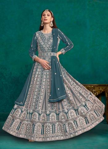 Garb These Party Wear Anarkali Suit in Fine Colored Pair With Bottom And Dupatta.These Top And Dupatta Are Fabricated On Faux Georgette Pair With Santoon Bottom.Its Beautified With Santoon Inner.Its Beautified With Designer Embroidery Work.