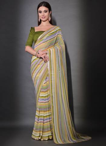 Garb These Party Wear Saree in Fine Colored.These Saree Are Georgette And Blouse is Mono Banglori Fabricated.Its Beautified With Designer Sequance Lining Embroidery Work.