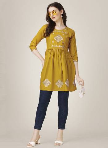 Attrective These Beautiful Looking Readymade Short Kurti.These Kurti is Fabricated On Rayon.Its Beautified With Designer Thread,Sequance Embroidery Work .