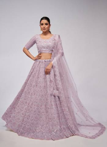 For A Fancy Designer Look,Grab These Lehenga Choli With Dupatta in Fine Colored.These Lehenga And Choli Are Soft Net And Dupatta Are Fabricated On Soft Net Pair.Its Beautified With Designer Sequance,Cut Dana Embroidery,Diamond,Stone Work.