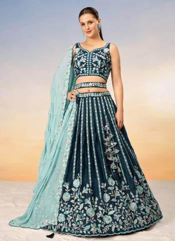 Attrective Looking This Partywear Fine Color Heavy Designer Choli And Lahenga Satin And Dupatta Georgette In Fabricated Beautified With Attrective Designer Thread,Sequance Embroidery Work. Buy Now.