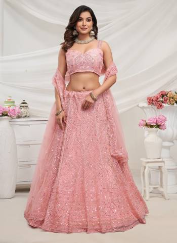 For A Fancy Designer Look,Grab These Lehenga Choli With Dupatta in Fine Colored.These Lehenga And Choli Are Soft Net And Dupatta Are Fabricated On Soft Net Pair.Its Beautified With Designer Sequance,Cut Dana Embroidery,Diamond,Stone Work.