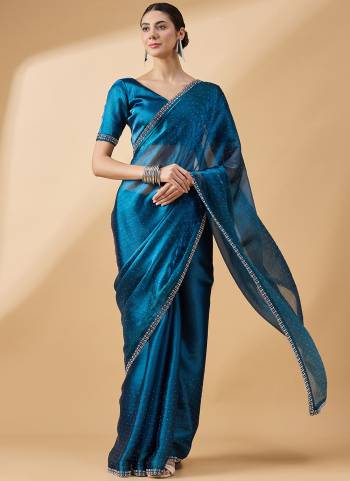 Garb These Designer Party Wear Saree in Fine Colored.These Saree And Blouse Organza is Fabricated.Its Beautified Desiger Swarovski,Stone Work.