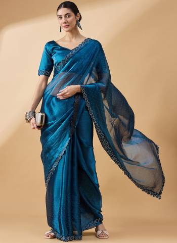 Garb These Designer Party Wear Saree in Fine Colored.These Saree And Blouse Organza is Fabricated.Its Beautified Desiger Swarovski,Stone Work.