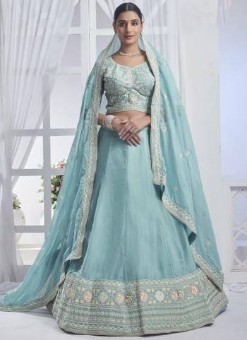 For A Designer Look,Grab These Lehenga Choli in Fine Colored.These Lehenga And Blouse Are Fabricated On Organza Pair With Organza Dupatta.Its Beautified With Designer Multy Thread,Sequance Embroidery Work.