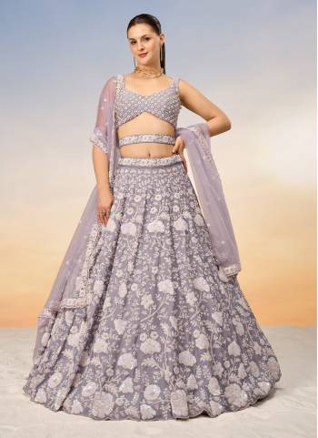 Attrective Looking This Partywear Fine Color Heavy Designer Choli And Lahenga Georgette And Dupatta Net In Fabricated Beautified With Attrective Designer Thread,Sequance Embroidery Work. Buy Now.