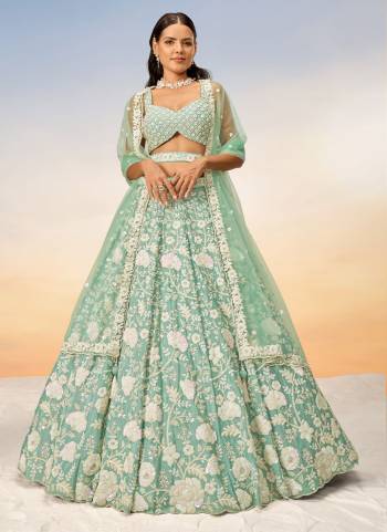 Attrective Looking This Partywear Fine Color Heavy Designer Choli And Lahenga Georgette And Dupatta Net In Fabricated Beautified With Attrective Designer Thread,Sequance Embroidery Work. Buy Now.