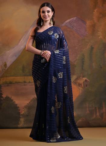 Looking These Party Wear Saree in Fine Colored.These Saree Are Georgette And Blouse is Mono Banglori Fabricated.Its Beautified With Designer Sequance Embroidery Work.