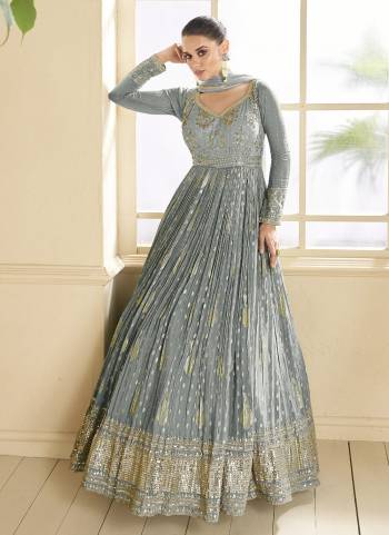 Garb These Party Wear Designer Anarkali Suit in Fine Colored Pair With Bottom And Dupatta.These Top Are Georgette And Dupatta Are Fabricated On Georgette Pair With Santoon Bottom.Its Beautified With Crepe Inner.Its Beautified With Heavy Designer Embroidery Work.