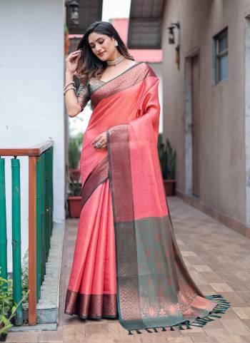 Garb These Party Wear Saree in Fine Colored.These Saree And Blouse is Fabricated On Kanjivaram Silk.Its Beautified With Weavon Copper Jari Designer.