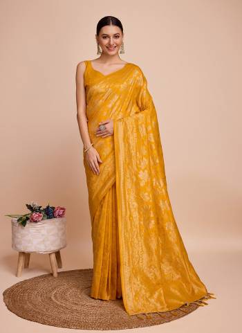 Garb This Partywear Saree Paired With Blouse.This Saree And Blouse Are Handloom Silk Based Fabric With Weaving Copper Jari Designer. Buy This Pretty Saree Now.