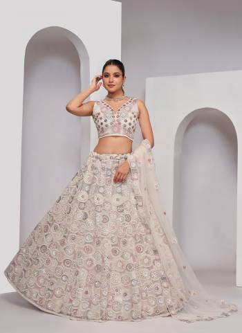 For A Fancy Designer Look,Grab These Lehenga Choli With Dupatta in Fine Colored.These Lehenga And Choli Are Soft Net And Dupatta Are Fabricated On Soft Net Pair.Its Beautified With Designer Heavy Embroidery,Stone Work.