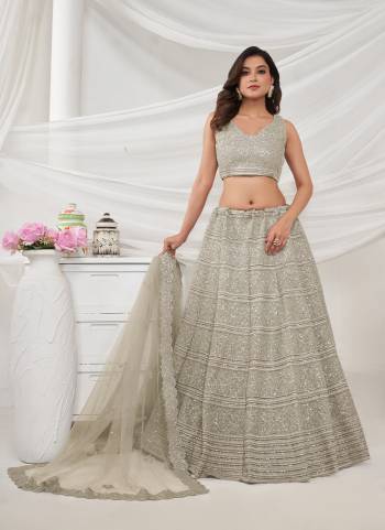 For A Fancy Designer Look,Grab These Lehenga Choli With Dupatta in Fine Colored.These Lehenga And Choli Are Soft Net And Dupatta Are Fabricated On Soft Net Pair.Its Beautified With Designer Heavy Embroidery,Stone Work.