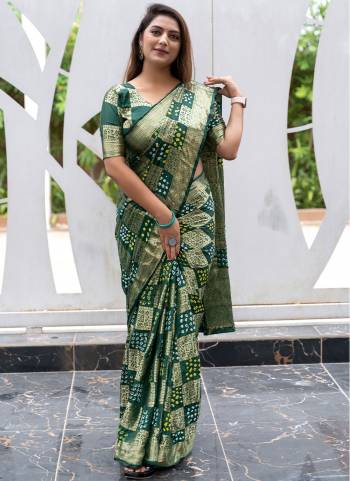 Looking These Festive Wear Saree in Fine Colored.These Saree And Blouse is Fabricated On Silk.Its Beautified With Wevon Jari Designer With Bandhej Printed.