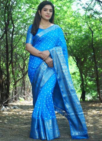 Attrective These Festive Wear Saree in Fine Colored.These Saree And Blouse is Fabricated On Kanjivaram Silk.Its Beautified With Wevon Jari Designer With Bandhej Work.