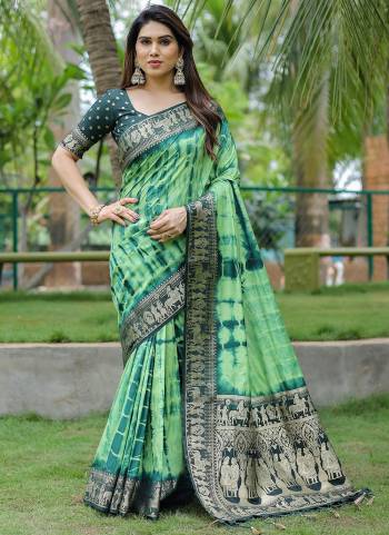 Garb These Festive Wear Saree in Fine Colored.These Saree And Blouse is Fabricated On Dola Silk.Its Beautified With Wevon Border Pallu Designer With Sibori Printed.