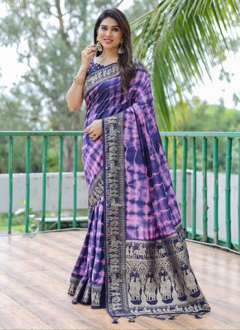 Garb These Festive Wear Saree in Fine Colored.These Saree And Blouse is Fabricated On Dola Silk.Its Beautified With Wevon Border Pallu Designer With Sibori Printed.