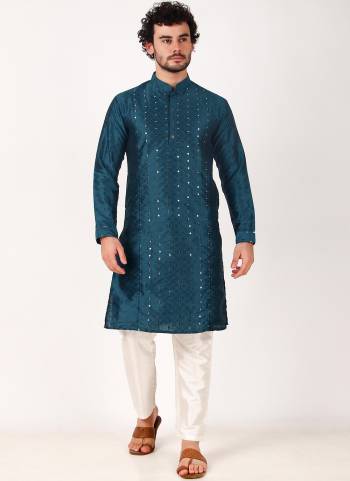 Garb These Designer Mens Wear Kurta With Bottom.Its Kurta And Bottom Are Art Silk Fabriced.Its Designer Mirror Embroidery Work.